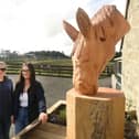 Assistant Countryrside Ranger Caitlyn Macmillan, right, unveiled the sculpture in memory of Hamish the Clydesdale horse at Muiravonside Country Park watched by Countryside Ranger Claire Martin and Team Leader Angus Duncan.