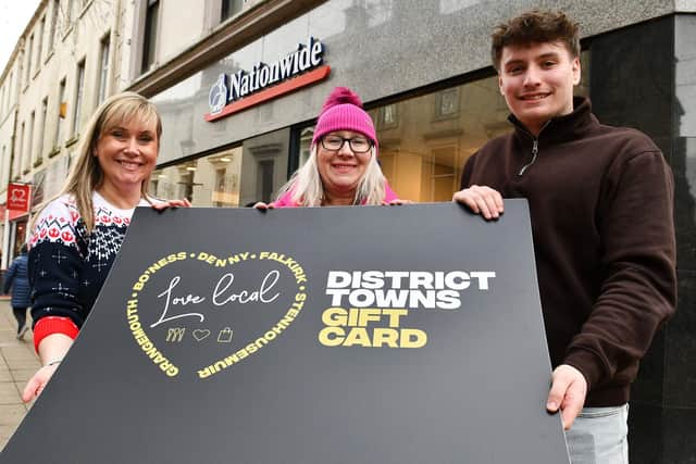Caroline Kelly, deputy branch manager at Falkirk's Nationwide branch with Elaine Grant from Falkirk Delivers and Rhys Campbell, member representative Nationwide.  (Pic: Michael Gillen)