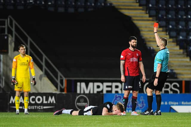 Mark Durnan sees red (Pic by Michael Gillen)