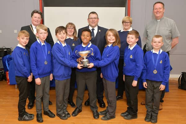 4th Falkirk Boys' Brigade Junior Section with the Efficiency Trophy and Provost Robert Bissett, Lt Mhairi Smith, Capt. Sandy Forsyth, Lt. Jill Kemp and Rev. Robert Allan. Pic: Michael Gillen