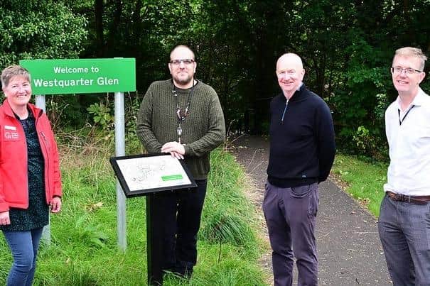 From left, Nicola Duenas (Green Action Trust), Councillor Bryan Deakin, Councillor Paul Garner, Danny Thallon (Falkirk Council) at Westquarter Glen, one of the sites to benefit from the Lower Braes Urban Woodlands Project.  (Pic: Falkirk Council)