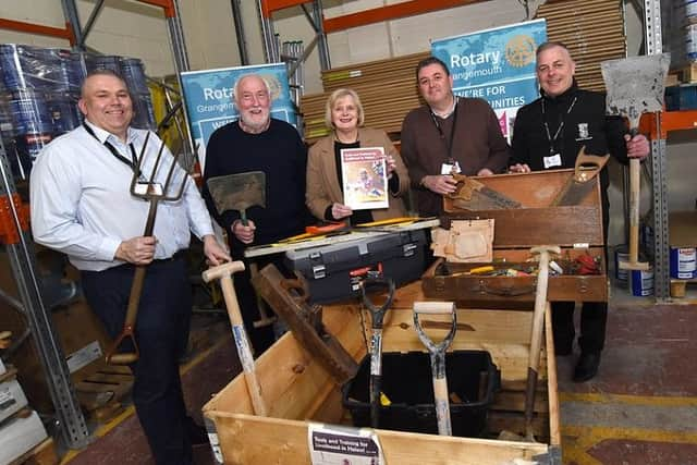 Robert Fotheringham, BMD acting service manager, George Nichol, of the Rotary Club of Grangemouth, Cecil Meiklejohn, Falkirk Council leader, and Brian Dick and Jim MacDonald, BMD assistant buildings operations co-ordinators the hand tool donations from employees