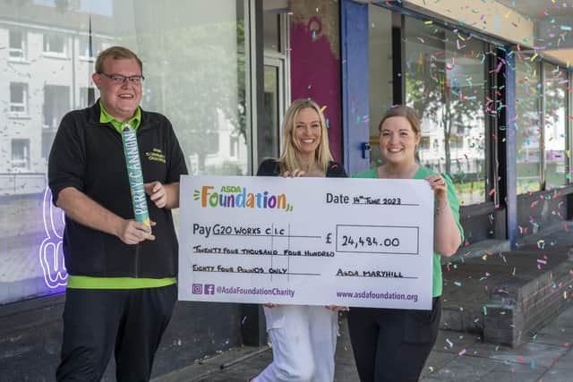Asda Maryhill Community Champion Ryan Rooney celebrates with G20 Works team