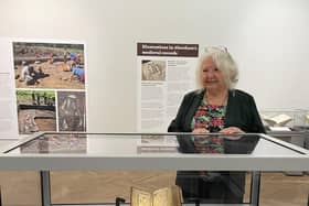 Anne Simpson, chair of the Book of Deer Project, with the manuscript. She said it felt 'unreal' that it was now on show in Aberdeen. PIC: Aberdeen City Council.