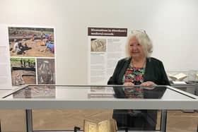 Anne Simpson, chair of the Book of Deer Project, with the manuscript. She said it felt 'unreal' that it was now on show in Aberdeen. PIC: Aberdeen City Council.