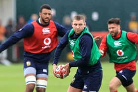 Finn Russell passes the ball during a recent British and Irish Lions training session (Photo by David Rogers/Getty Images)