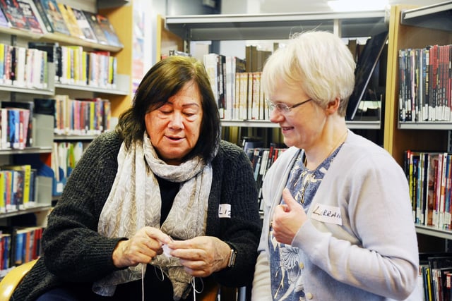 Liz Storey, left, and Lorraine Watt at the Knitting and Pom Pom Station. Larbert Library Knitting Group meet every fortnight on a Wednesday in the library.