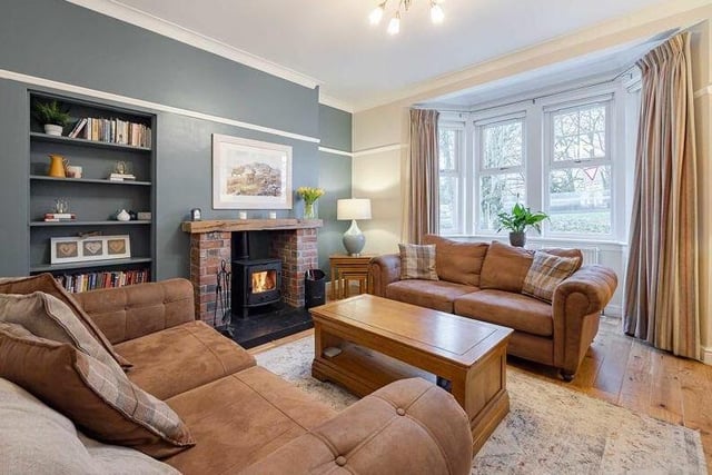 Beautiful bay window lets natural light flood in while the wood-burning stove is perfect for chilly winter nights.