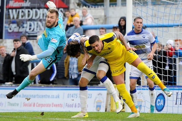 October 20, 2018: Morton 1, Falkirk 3
Ryan Scully, Gregor Buchanan and Tom Dallison challenging for a ball during a 3-1 victory for Falkirk against Morton at Cappielow Park. Their scorers were Aaron Muirhead, Andrew Nelson and Alex Jakubiak (Photo: Michael Gillen)