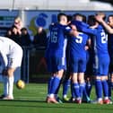 Cove celebrate the opening goal of the match (Pictures by Michael Gillen)