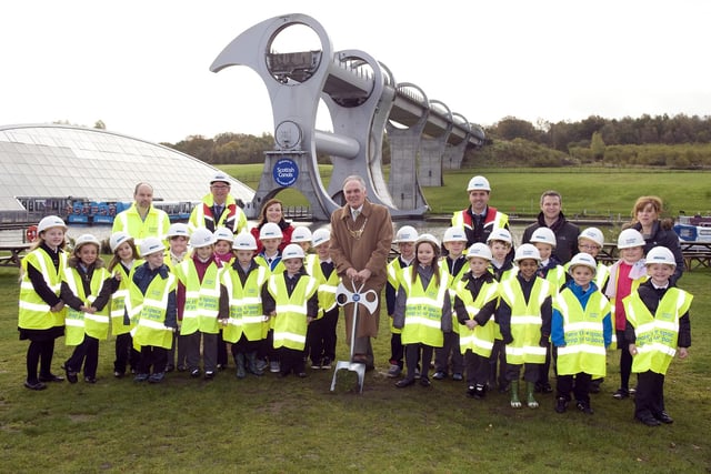 Provost Pat Reid cuts the first sod at the new planned playpark with pupils from Easter Carmuirs Primary 2014