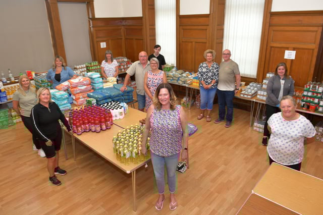 Keeping Larbert and Stenhousemuir Beautiful volunteers received funding through Stenhousemuir FC's Community Helpline Initiative to support its pantry operation. Picture: Michael Gillen.