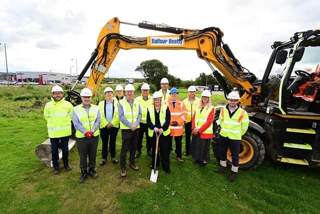 Leader of Falkirk Council Cecil Meiklejohn (front right) and spokesperson for Economic Development Councillor Paul Garner (front left) with members of the Invest Falkirk and Balfour Beatty teams delivering the transformational work. Pic: Lisa Evans / Falkirk Council