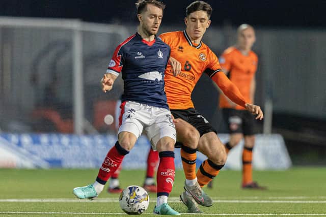 Falkirk’s Brad Spencer and Dundee United’s Chris Mochrie in action during a 4-2 SPFL Trust Trophy win for the Bairns at home in November 2023 (Photo by Mark Scates/SNS Group)