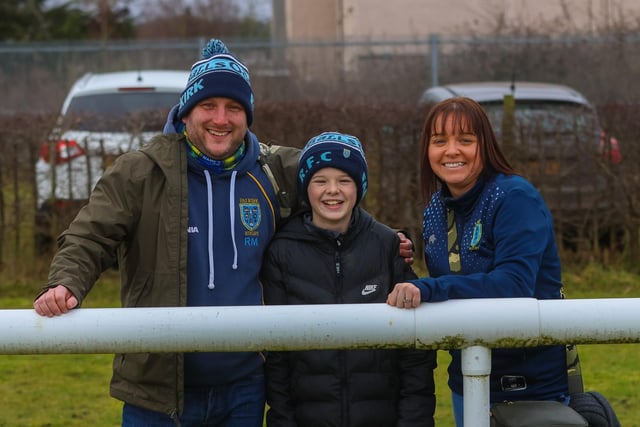 Ronnie, Kerry and Ramsey of Falkirk Rugby Club watch on
