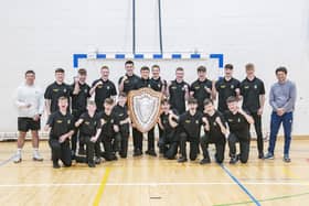 Linlithgow Academy Under 18s football team celebrate winning the Scottish Cup.