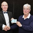 David Wheeler, chairman and president, of Falkirk Burns club, presents a cheque for £500 to Alastair Blackstock, chairman Falkirk Foodbank. Pic: Michael Gillen