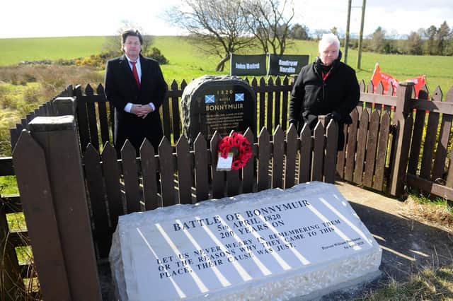 Provost Billy Buchanan (right) with Councillor Robert Bissett (left) lay a wreath on the new stone to mark the 201th anniversary (Pic: Michael Gillen)