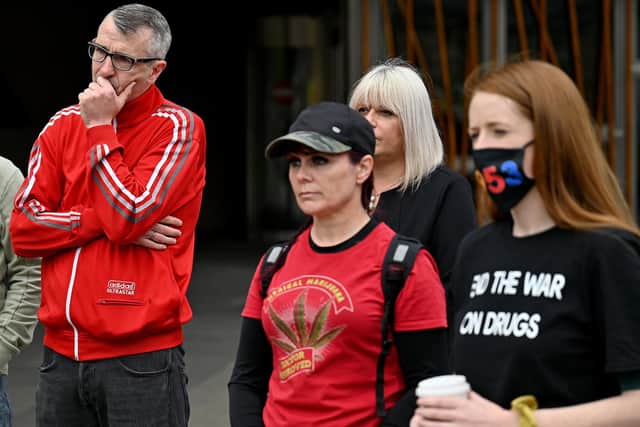 Peter Krykant (far left) reacts outside the Scottish Parliament alongside other bereaved family members during a ceremony to mark International Overdose Awareness Day. Picture: Jeff J Mitchell/Getty Images