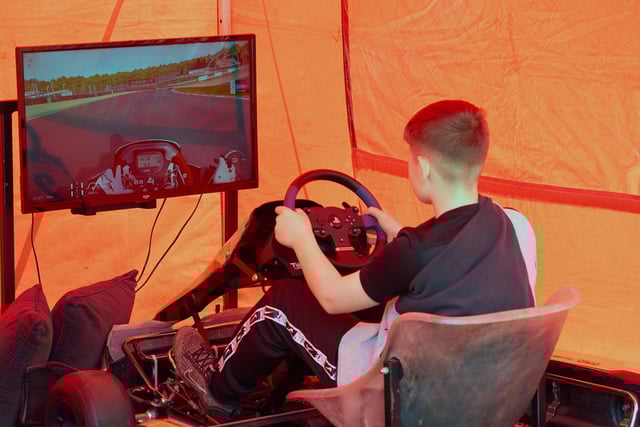 Trying out a race simulator.