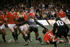 Who is this former Wales front row forward, pictured on the charge during NZ Juniors and the British Lions clash in Wellington, New Zealand in 1977 (Photo: Adrian Murrell/Getty Images)