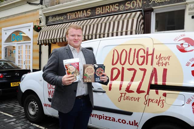 Robert Buchanan, director of Kloist Foods, at Dough Your Own Pizza stockist Thomas Burns and Son in Bo'ness. Picture: Michael Gillen.