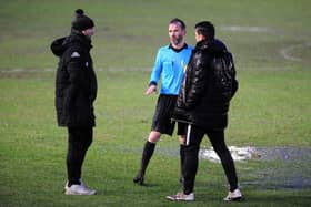 Referee George Calder calling off Camelon Juniors' Scottish Cup game against Brora Rangers on Saturday. Photo: Michael Gillen