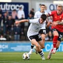 Ayr United's Dylan Watret, who was on loan at East Stirlingshire last season, battles with Falkirk's Calvin Miller (Photo: Michael Gillen)