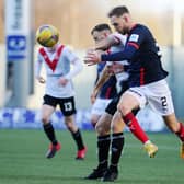 Scott Mercer challenges for the ball with Airdrie's Dale Carrick in Sunday's 1-0 defeat for the Bairns