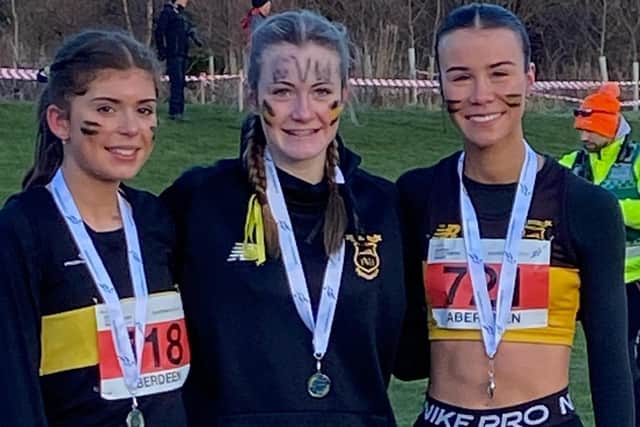 U17 girls Lucie Gibson, Katie Hedges and Isabella Ogg with their silver medals