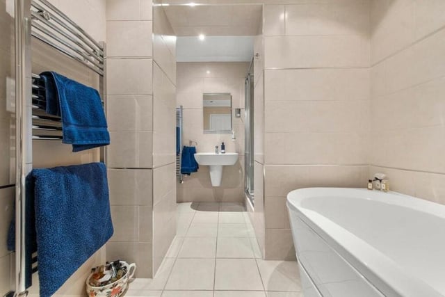 The modern family bathroom offers a free-standing bath, as well as a shower, and there’s a handy wc too.