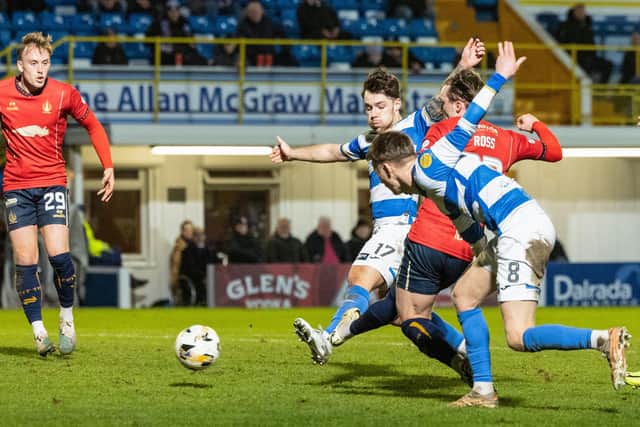 Falkirk winger Ethan Ross scores to make it 2-0 against Greenock Morton during last Friday night's match (Photo: Mark Scates/SNS Group)