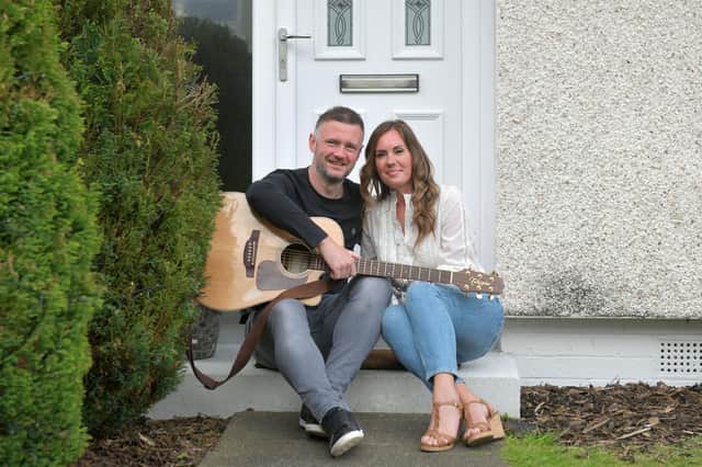 Singer Liam McGrandles and wife Fiona held a front garden Facebook Live gig at their Denny home in support of two food banks. Picture: Michael Gillen.
