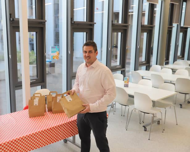 FVC's chef manager Gareth Davies with the food to go packages
(Picture: Submitted)