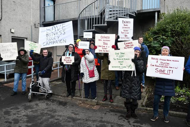 Residents from Bo'ness held a peaceful protest before the start of today's council meeting to discuss the proposal to close the town's recreation centre. Pic: Michael Gillen