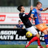 Steven Hetherington, left, in action against Queen's Park last Saturday (Pic by Michael Gillen)