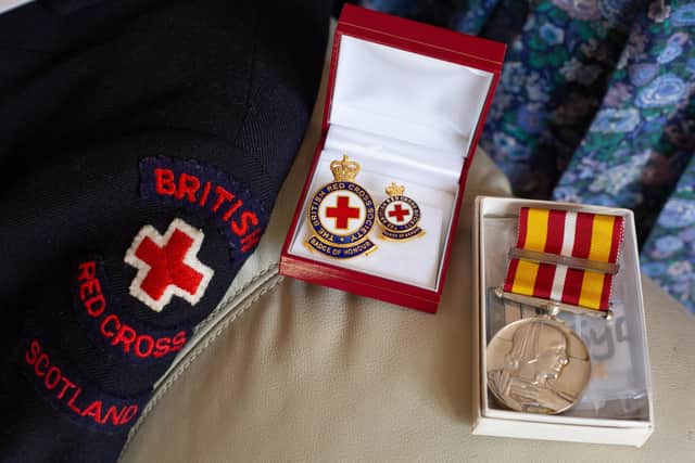 Some of Isabel Thom's mementos from over the last 75 years volunteering with the Red Cross. (Pic: Jeremy Sutton-Hibbert)