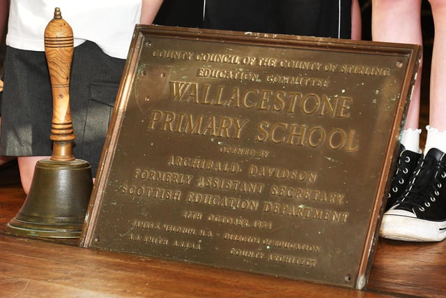 The original school commemoration plaque and bell that used to summon pupils for classes.