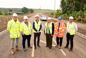 Members of the project team joined Depute Leader Councillor Paul Garner, middle left, and Leader Councillor Cecil Meiklejohn, middle right, for a final inspection before opening. Pic: Falkirk Council