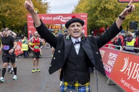 Consultant anaesthetist Ewan Jack finishes the Great Scottish Run wearing full Highland dress (Picture: Jeff Holmes)