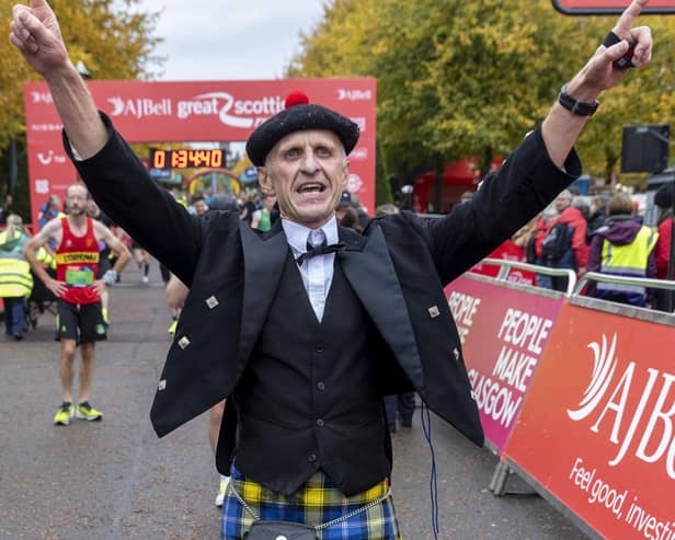 Consultant anaesthetist Ewan Jack finishes the Great Scottish Run wearing full Highland dress (Picture: Jeff Holmes)