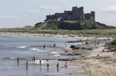 People enjoying the sunshine at Bamburgh Castle in Northumberland.
Pic: Owen Humphreys