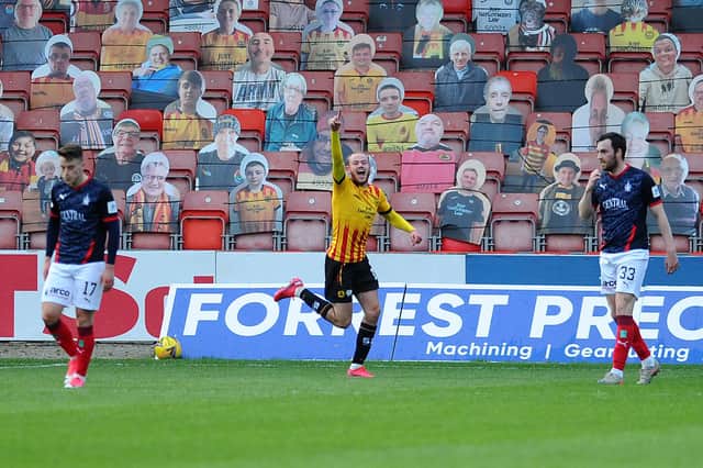 Former Falkirk striker Zak Rudden opened the scoring at Firhill as the Jags won 5-0 to be crowned League 1 champions