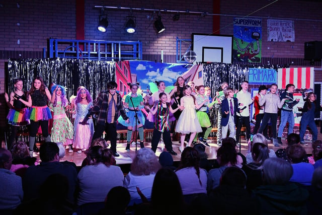 The talented young cst Denny Primary School's first ever panto Cinderella and Rockerfella.