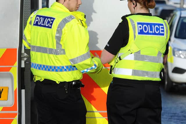 Police are searching for five people seen in the Bowhouse Road area of Grangemouth when a robbery took place