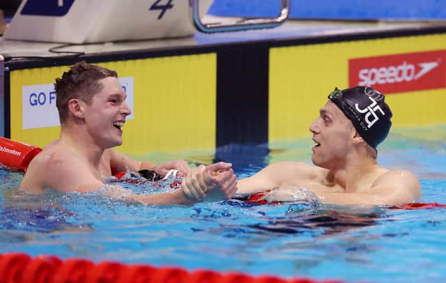 Duncan Scott of University of Stirling and James Guy of Manchester Performance Centre celebrate after winning joint Gold in the Men's 200m Freestyle Final during day six of the British Swimming Championships (Photo by Alex Davidson/Getty Images)