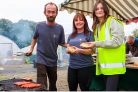 Steve, Danielle and Kimberley from STS get the barbecue going. (Pics: Scott Louden)