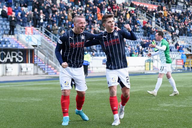 Goalscorer Leigh Griffiths celebrates his first goal for the club with teammate Charlie Telfer (Picture: Ian Sneddon)