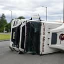 The lorry over turned on the A904 Timber Basin Roundabout in Grangemouth
(Picture: Michael Gillen, National World)