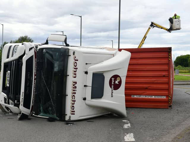 The lorry over turned on the A904 Timber Basin Roundabout in Grangemouth
(Picture: Michael Gillen, National World)